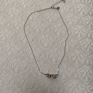 Silver tone necklace with gold accent